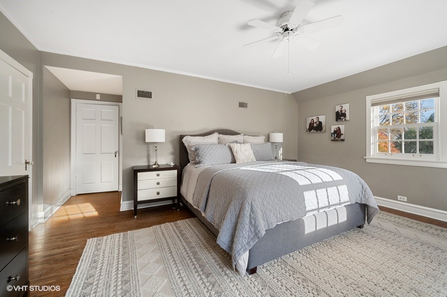 375 Sterling Road Kenilworth, IL 60043 - Photo 16 of 28 a bedroom with a bed and wooden floor