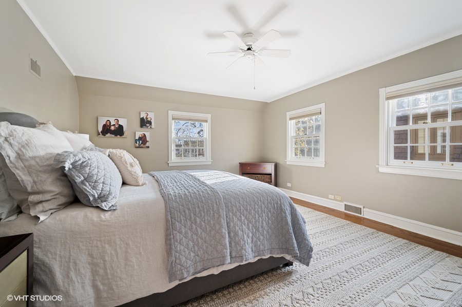 375 Sterling Road Kenilworth, IL 60043 - Photo 17 of 28 a bedroom with a large bed and a window