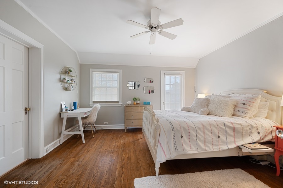 375 Sterling Road Kenilworth, IL 60043 - Photo 20 of 28 a bedroom with a bed and a wooden floor