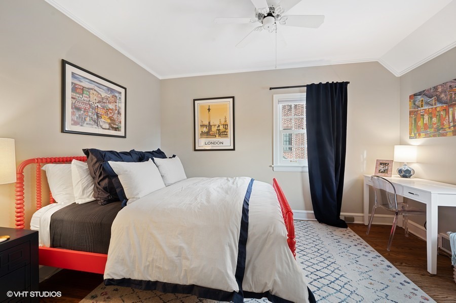 375 Sterling Road Kenilworth, IL 60043 - Photo 21 of 28 a bedroom with bed and a chandelier