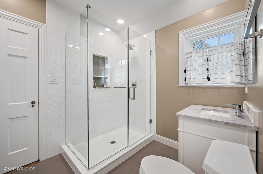 375 Sterling Road Kenilworth, IL 60043 - Photo 22 of 28 a bathroom with a sink toilet and shower