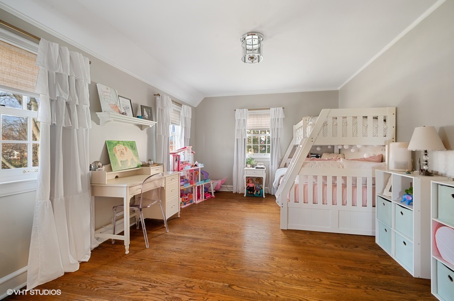 375 Sterling Road Kenilworth, IL 60043 - Photo 23 of 28 a bedroom with furniture and a wooden floor