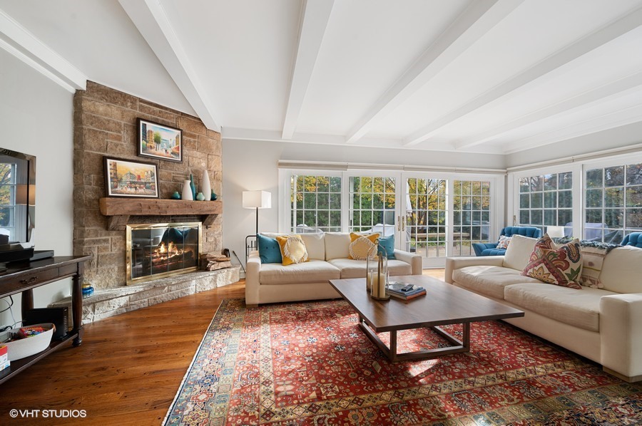 375 Sterling Road Kenilworth, IL 60043 - Photo 7 of 28 a living room with fireplace furniture and a large window