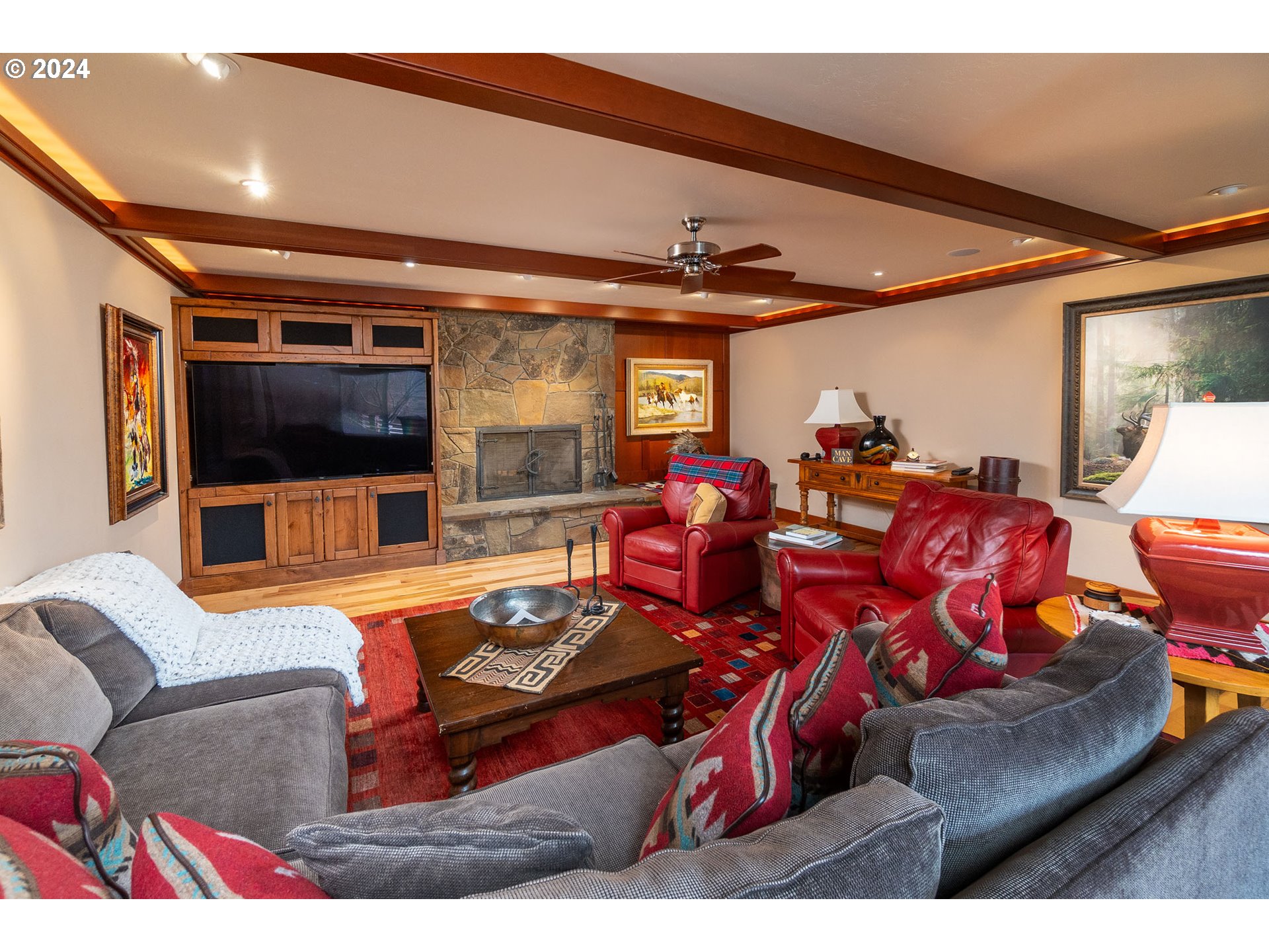 6100 Eightmile Road The Dalles, OR 97058 - Photo 12 of 44 a living room with furniture a large window and flat screen tv