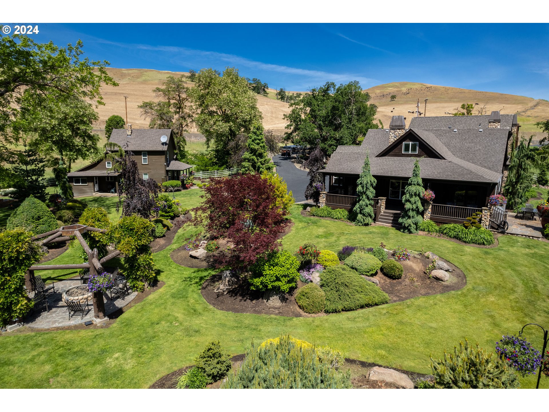 6100 Eightmile Road The Dalles, OR 97058 - Photo 4 of 44 a view of a house with a yard