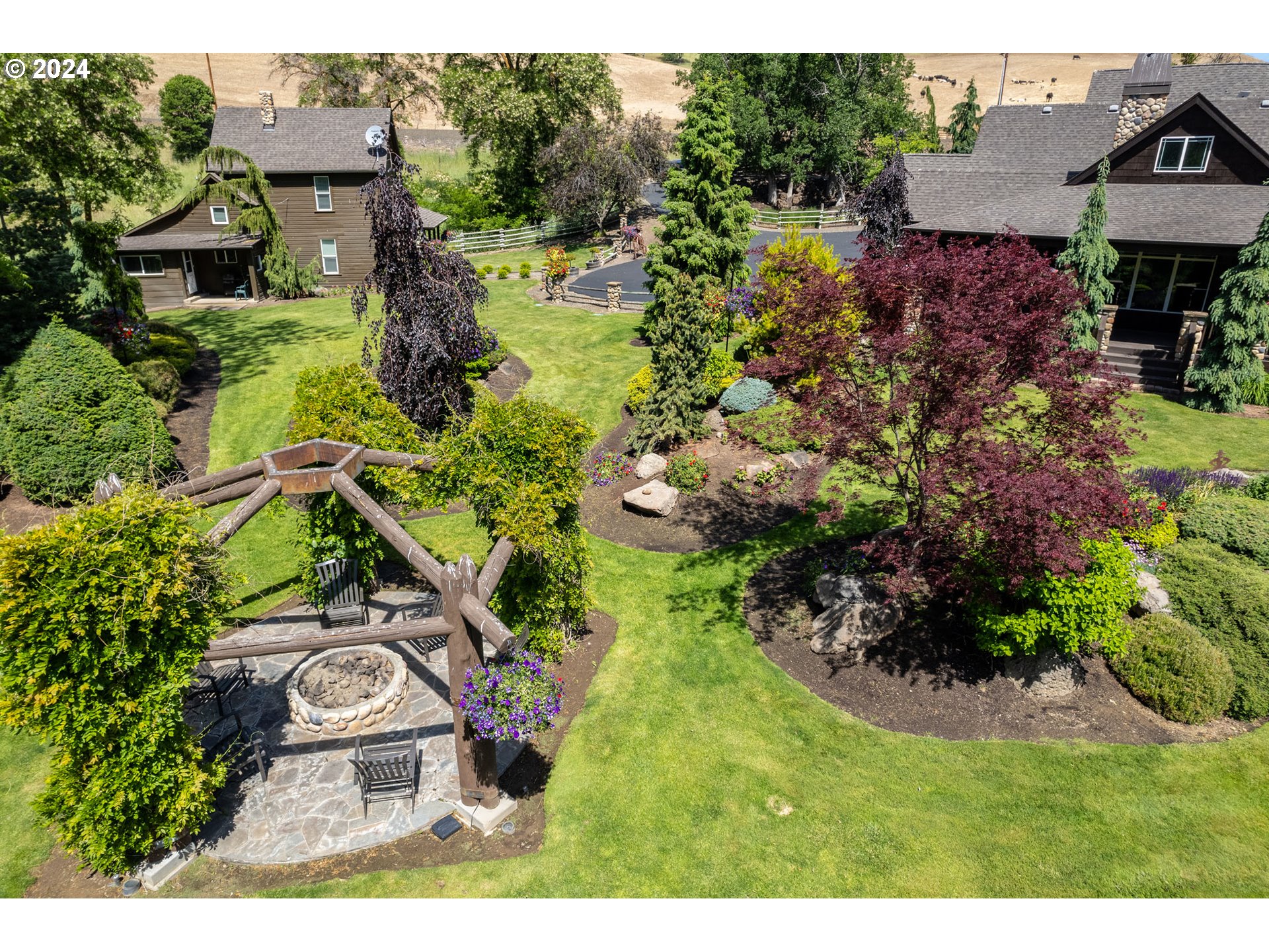 6100 Eightmile Road The Dalles, OR 97058 - Photo 7 of 44 a aerial view of a house with a yard