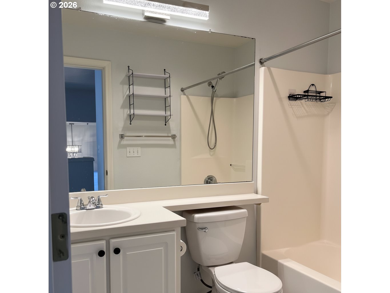14110 Southwest Barrows Road, Unit 1 Portland, OR 97223 - Photo 15 of 18 a bathroom with a sink toilet and shower