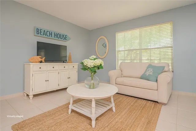 a bedroom with a bed and chair