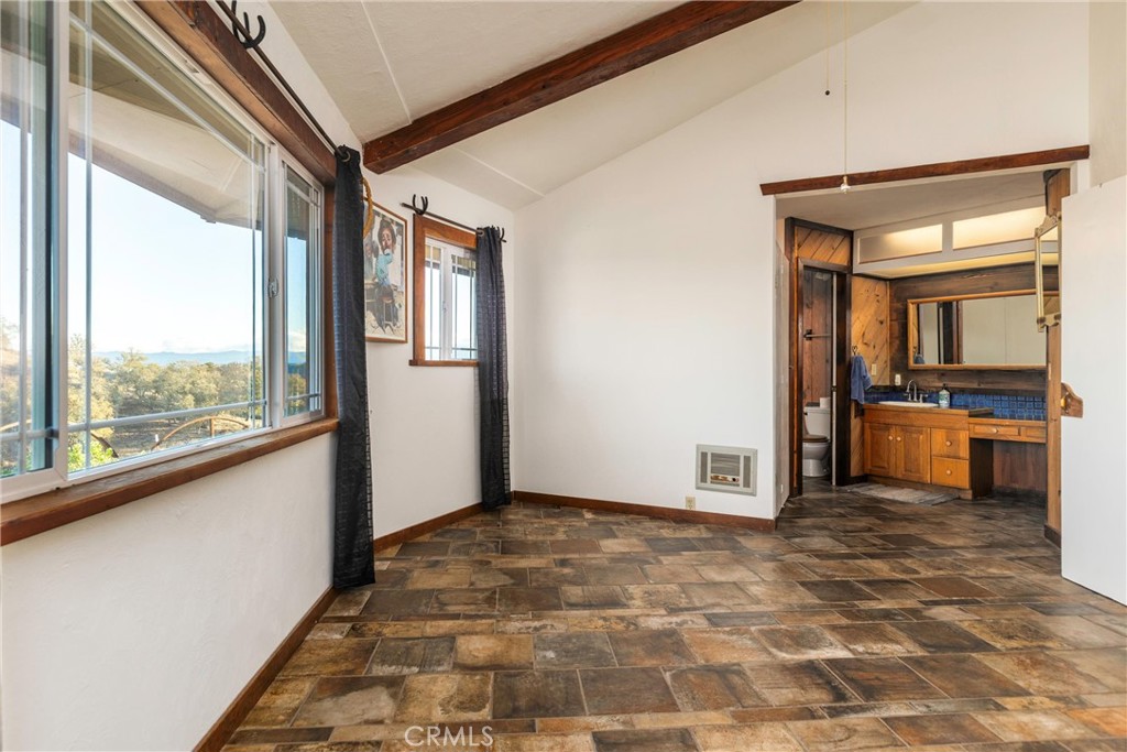 2505 Smith Road Bradley, CA 93426 - Photo 36 of 72 a view of a hallway with a dining table & chairs