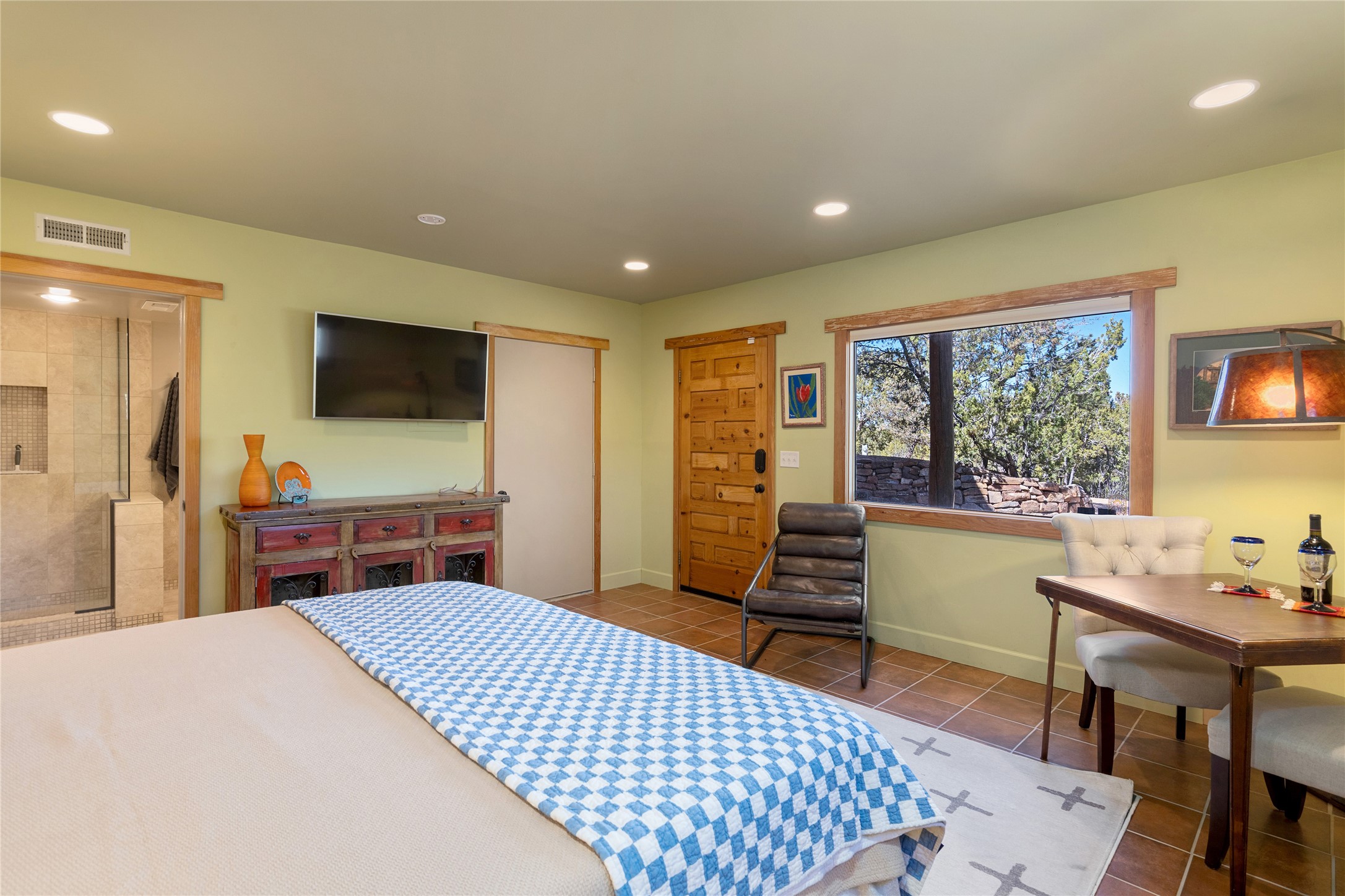 1204 Bandolina Road Santa Fe, NM 87501 - Photo 52 of 69 Lower Casita bedroom, 3/4 bath