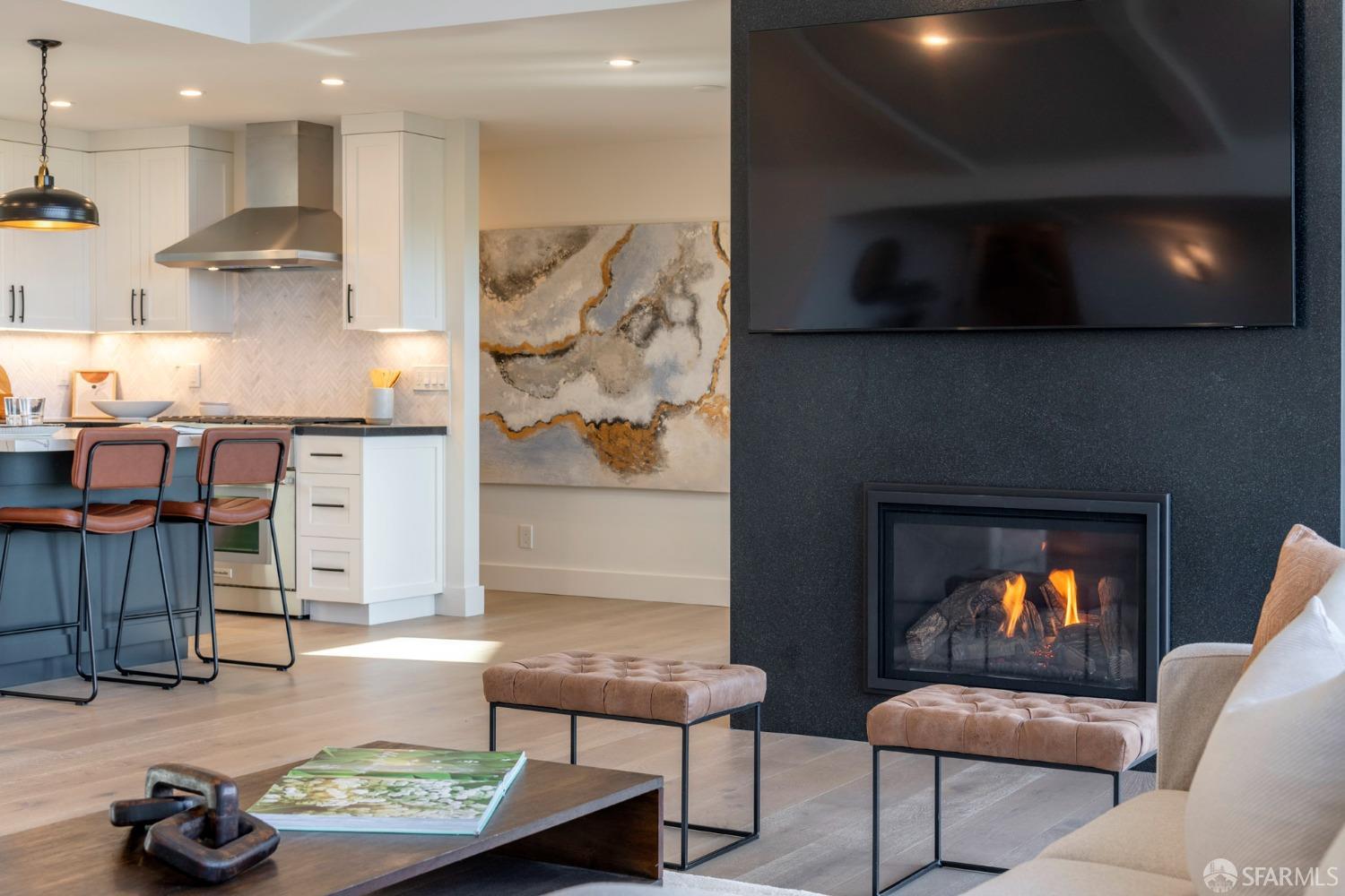 155 Brookwood Road Woodside, CA 94062 - Photo 12 of 60 a living room with furniture and a fireplace