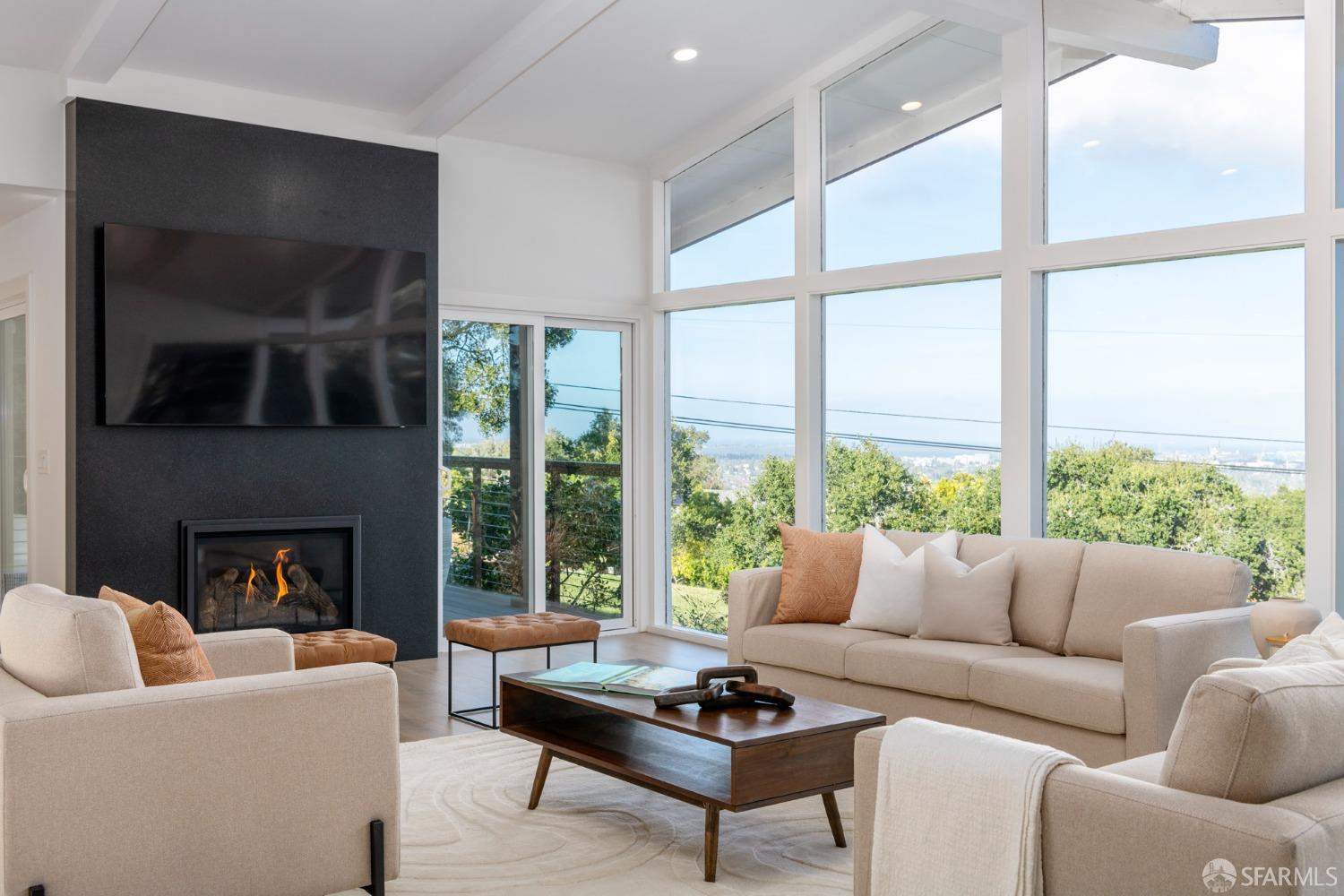 155 Brookwood Road Woodside, CA 94062 - Photo 13 of 60 a living room with furniture and a fireplace