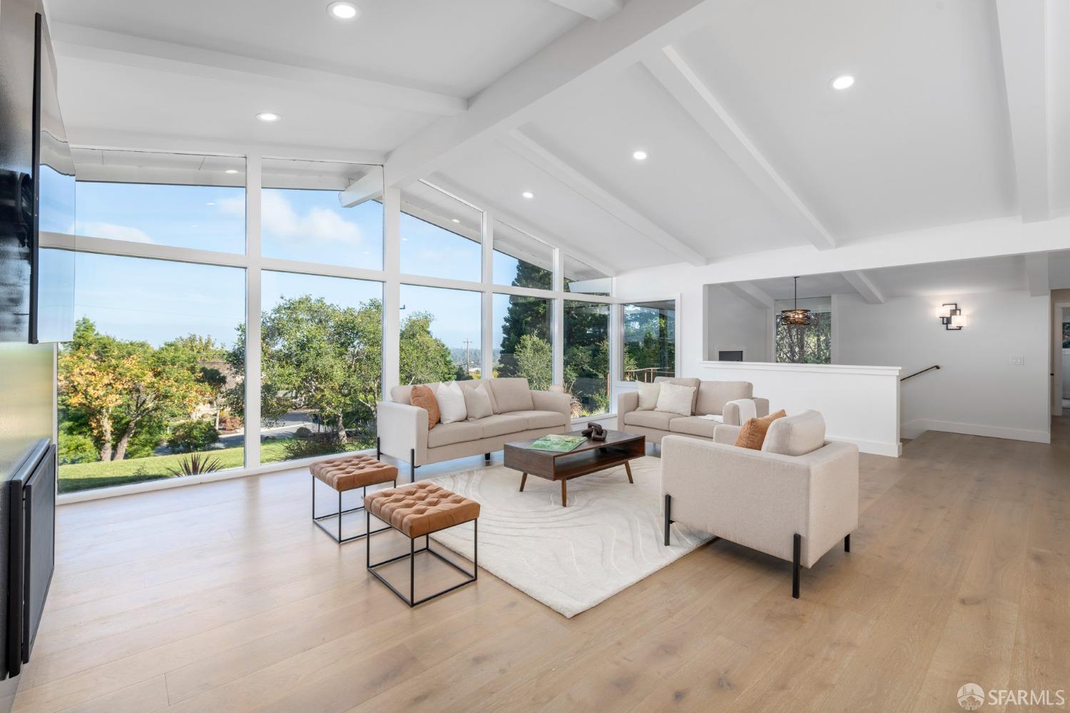 155 Brookwood Road Woodside, CA 94062 - Photo 14 of 60 a living room with couch and a large window