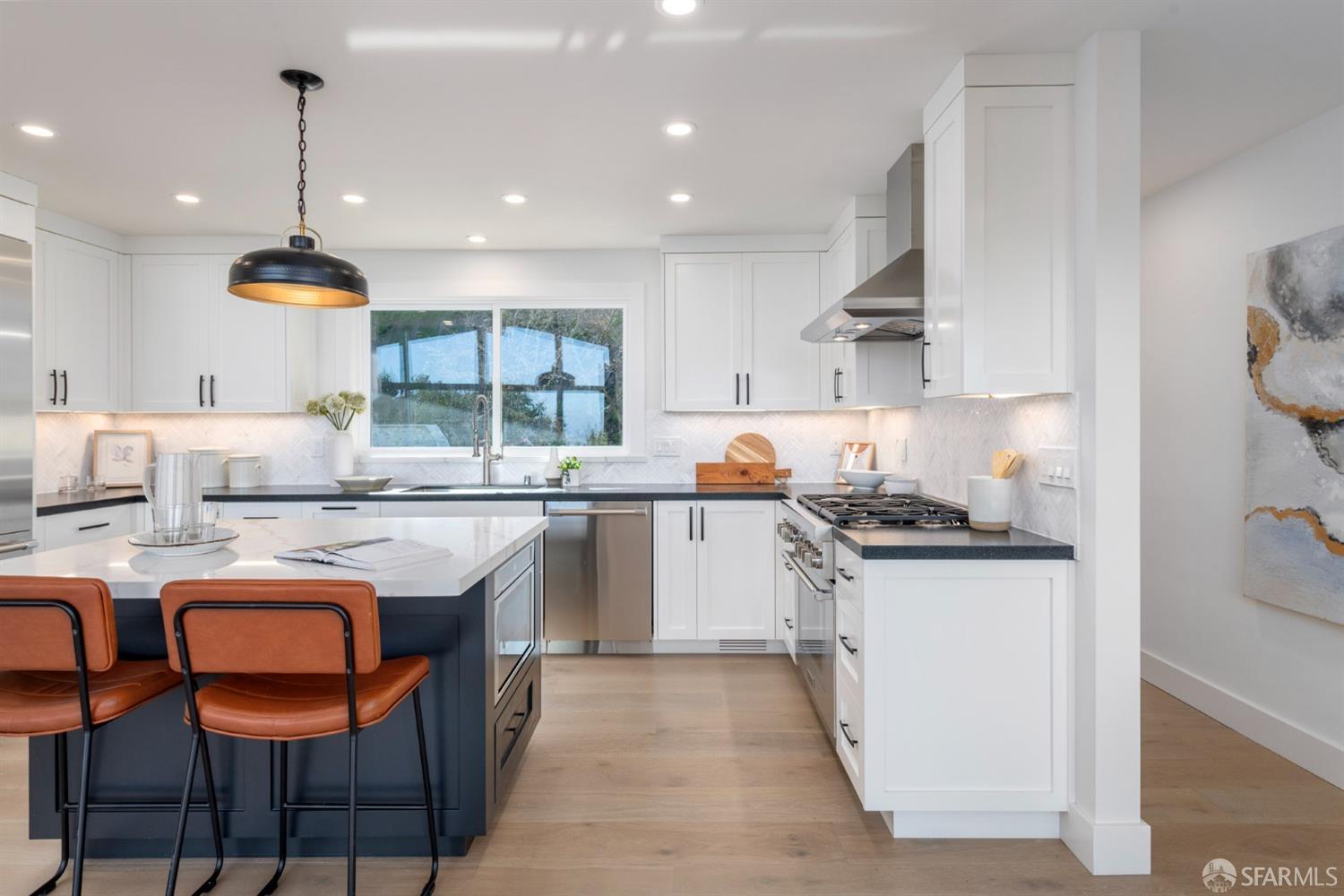 155 Brookwood Road Woodside, CA 94062 - Photo 19 of 60 a kitchen with granite countertop a sink and a stove