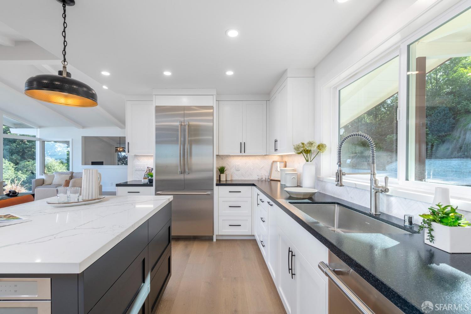 155 Brookwood Road Woodside, CA 94062 - Photo 20 of 60 a kitchen with stainless steel appliances granite countertop a sink stove and cabinets