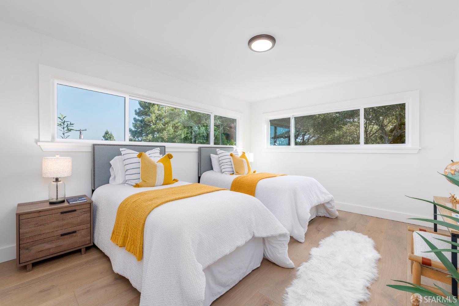 155 Brookwood Road Woodside, CA 94062 - Photo 23 of 60 a bed room with two bed and a night stand