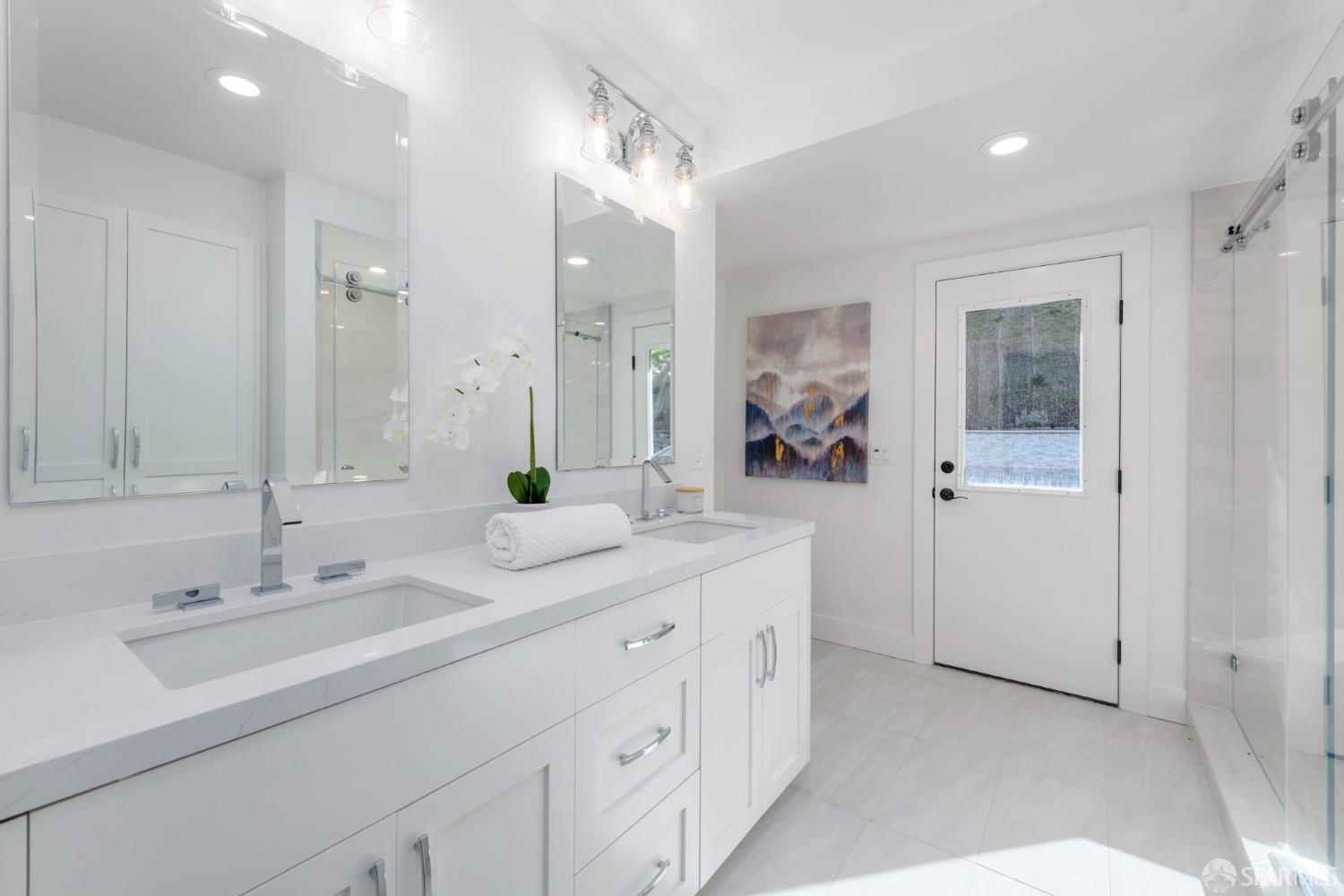 155 Brookwood Road Woodside, CA 94062 - Photo 29 of 60 a bathroom with double sink and a mirror