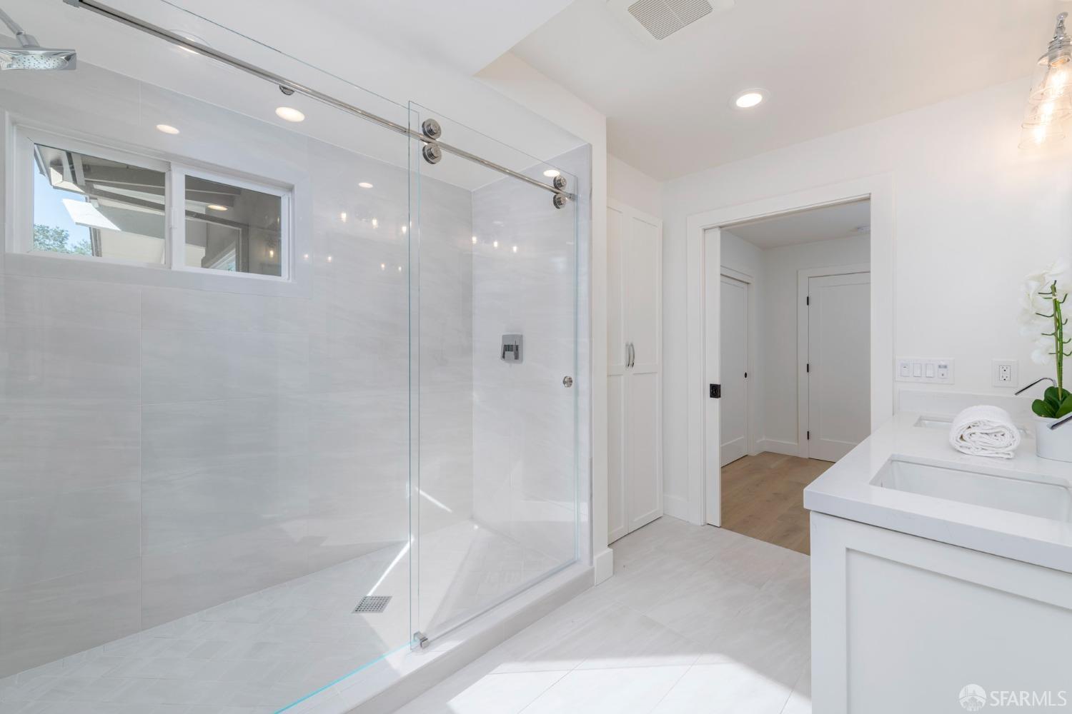 155 Brookwood Road Woodside, CA 94062 - Photo 30 of 60 a bathroom with a bathtub shower and toilet