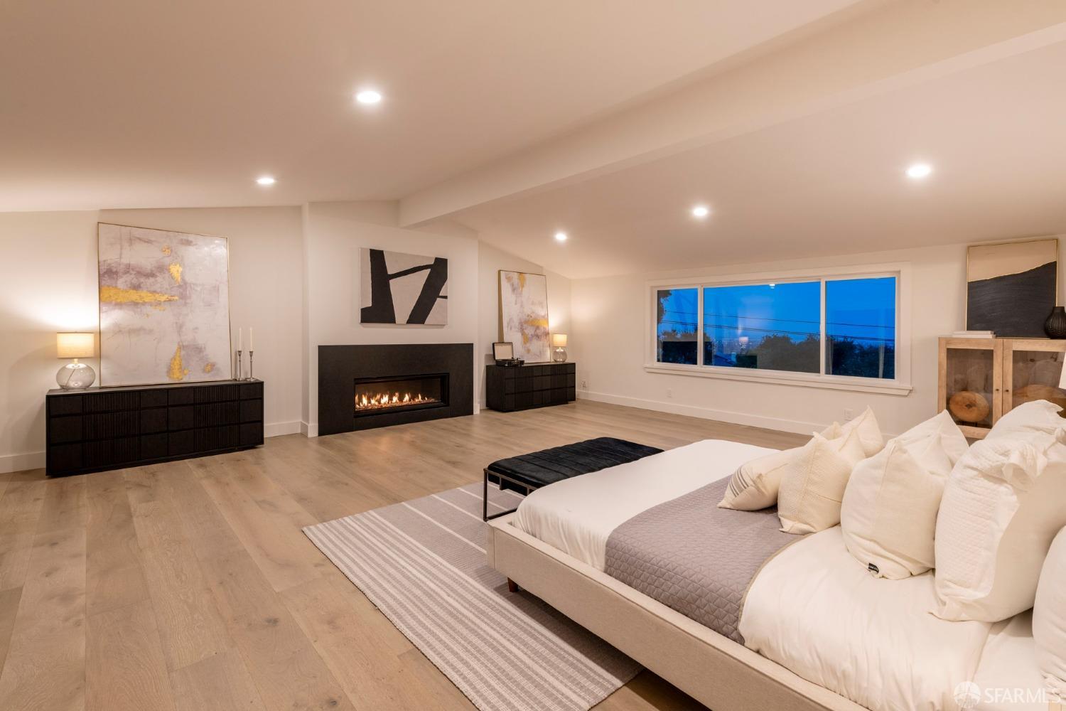 155 Brookwood Road Woodside, CA 94062 - Photo 48 of 60 a living room with furniture and a fireplace