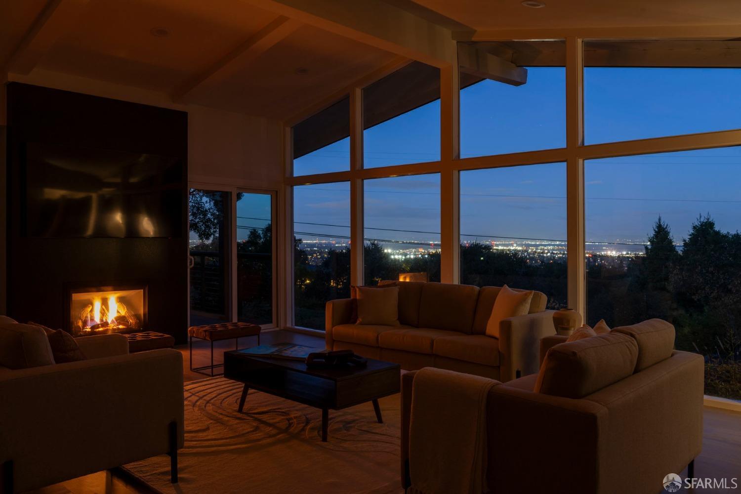155 Brookwood Road Woodside, CA 94062 - Photo 5 of 60 a living room with furniture and a floor to ceiling window
