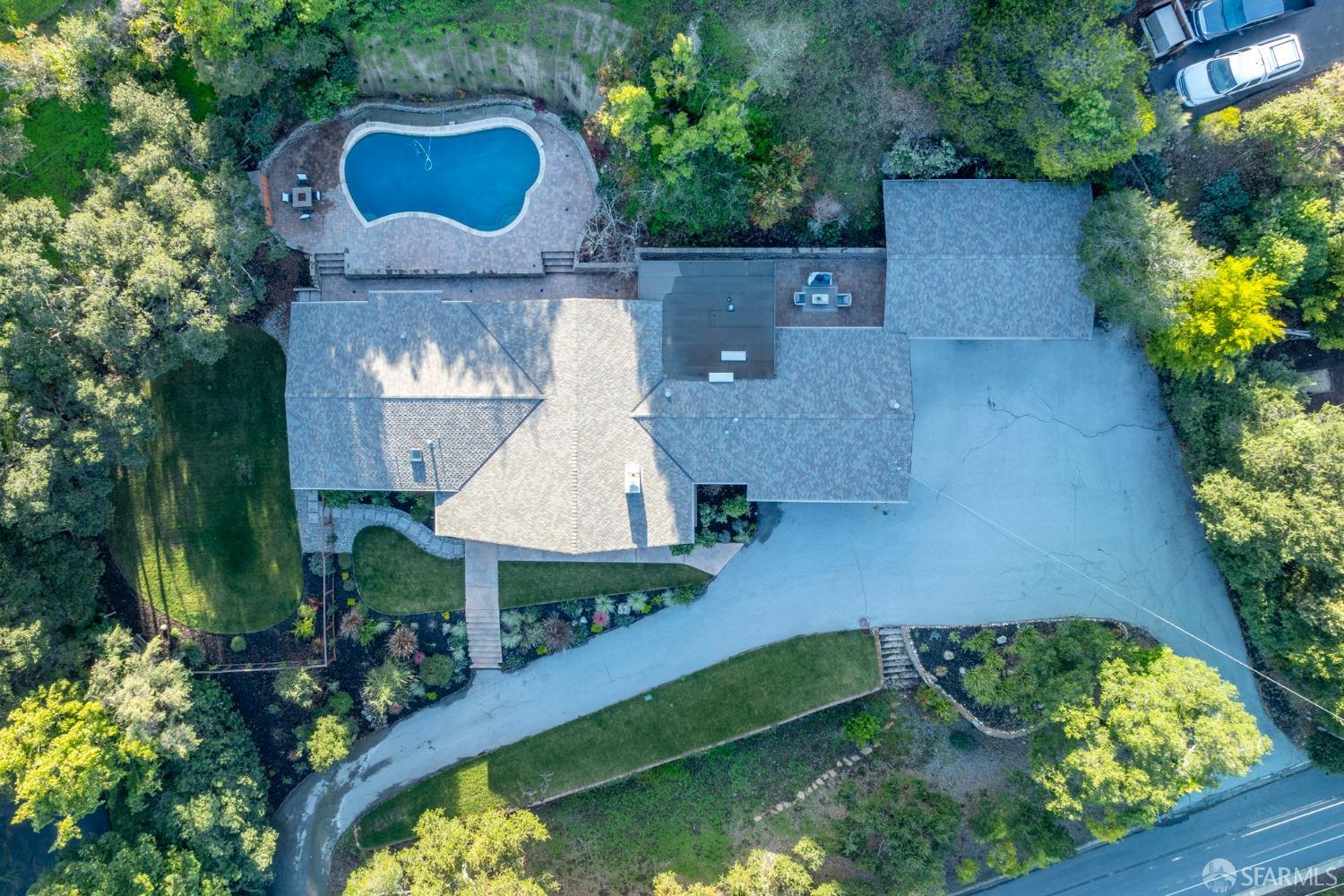 155 Brookwood Road Woodside, CA 94062 - Photo 52 of 60 an aerial view of a house with yard swimming pool and outdoor seating