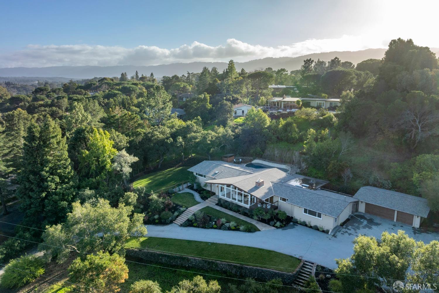 155 Brookwood Road Woodside, CA 94062 - Photo 58 of 60 an aerial view of a house with a garden