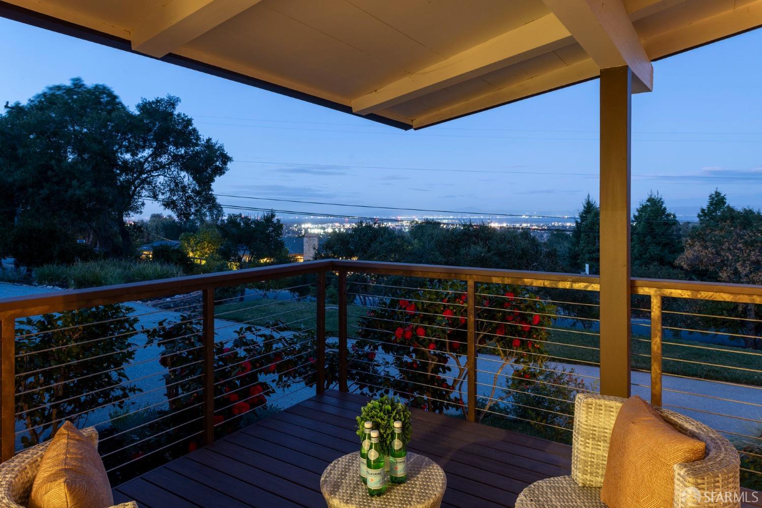 155 Brookwood Road Woodside, CA 94062 - Photo 8 of 60 a view of a balcony with wooden floor and outdoor seating