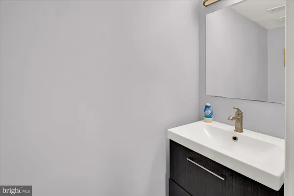 a view of a bathroom from the hallway