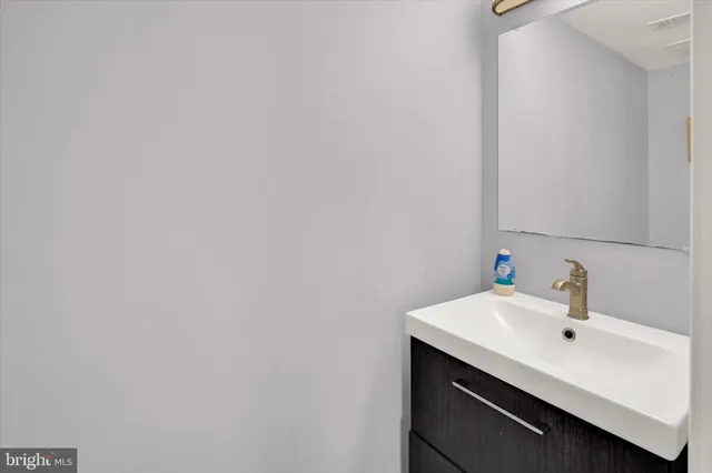 a view of a bathroom from the hallway