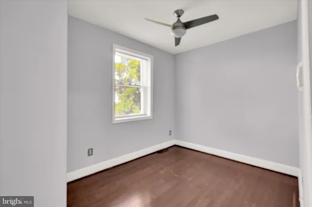 a view of room with hardwood floor