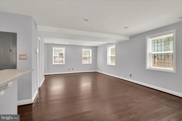 a view of a kitchen with electric appliances