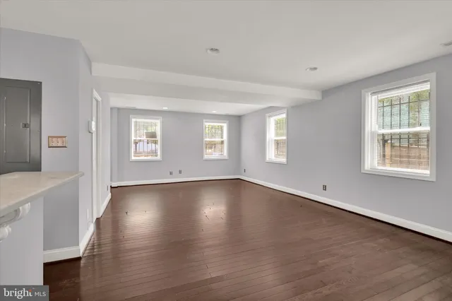 a view of a kitchen with electric appliances