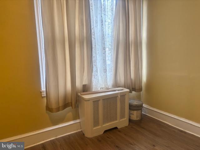 5630 Walnut Street, Unit 2 Philadelphia, PA 19139 - Photo 5 of 28 a view of a room with a window and wooden floor