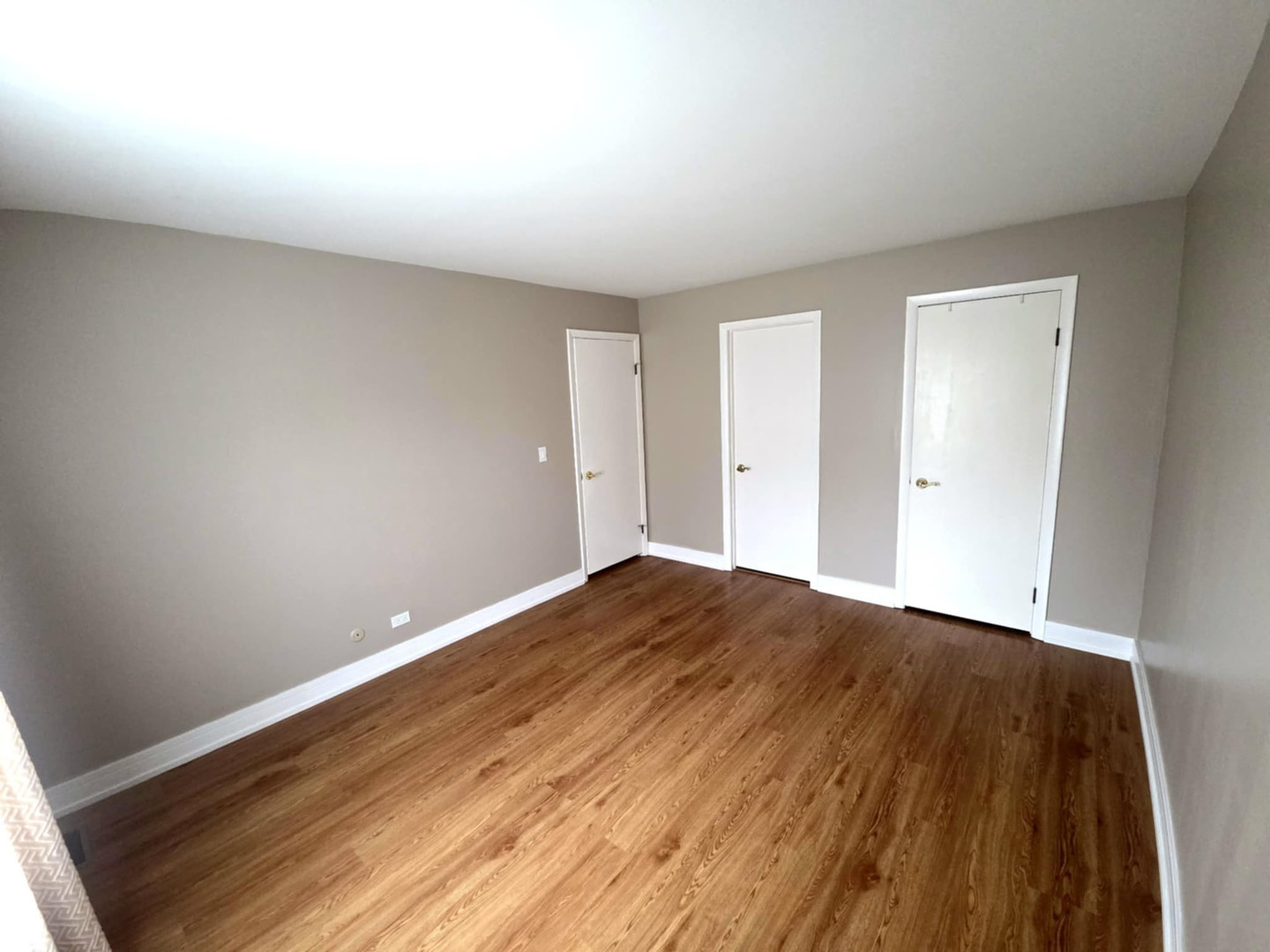 366 Pinetree Lane, Unit B1 Schaumburg, IL 60193 - Photo 13 of 23 a view of empty room with wooden floor