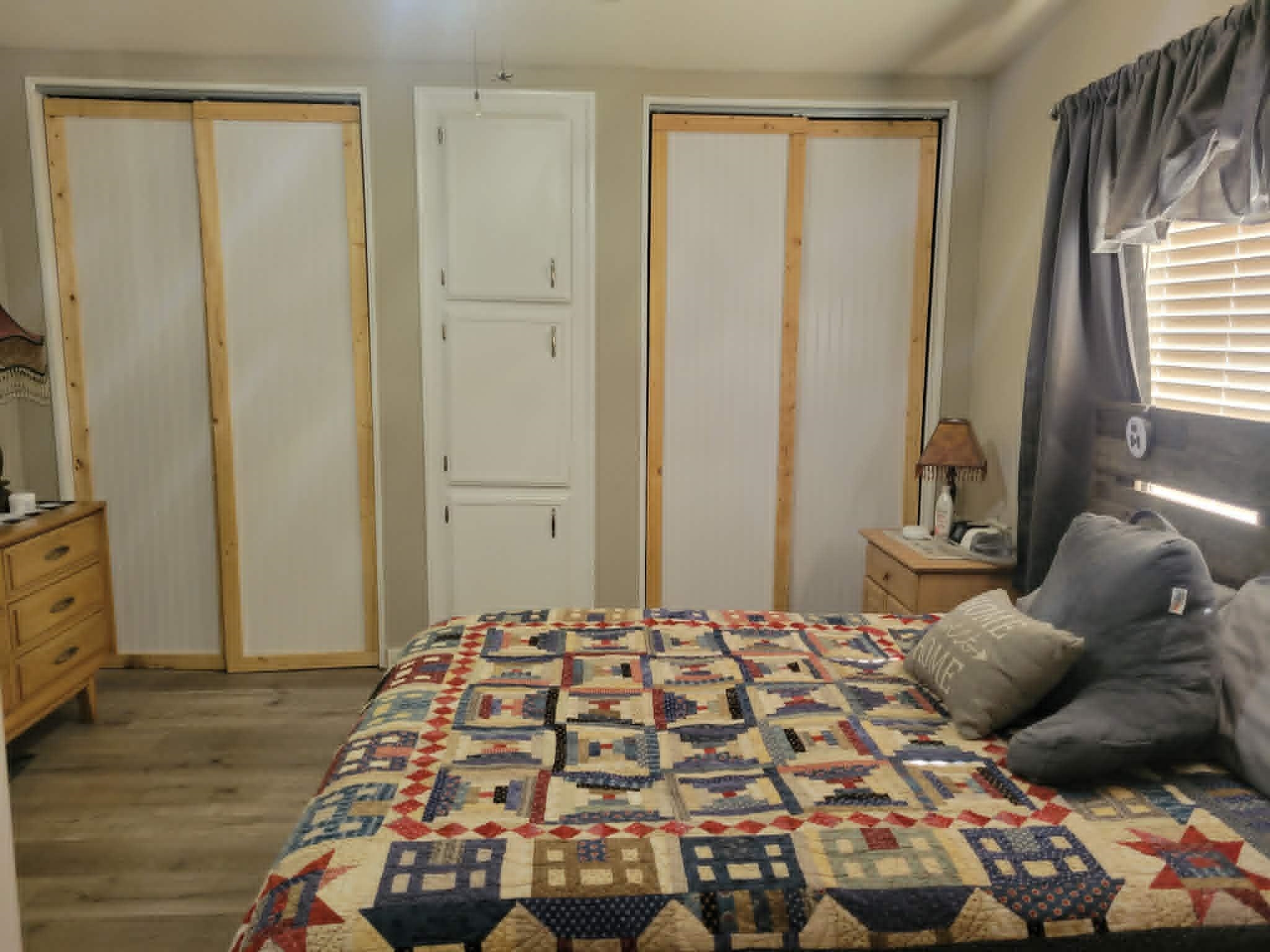 493 Mule Deer Road Coleville, CA 96107 - Photo 17 of 39 a bedroom with a bed and wooden floor