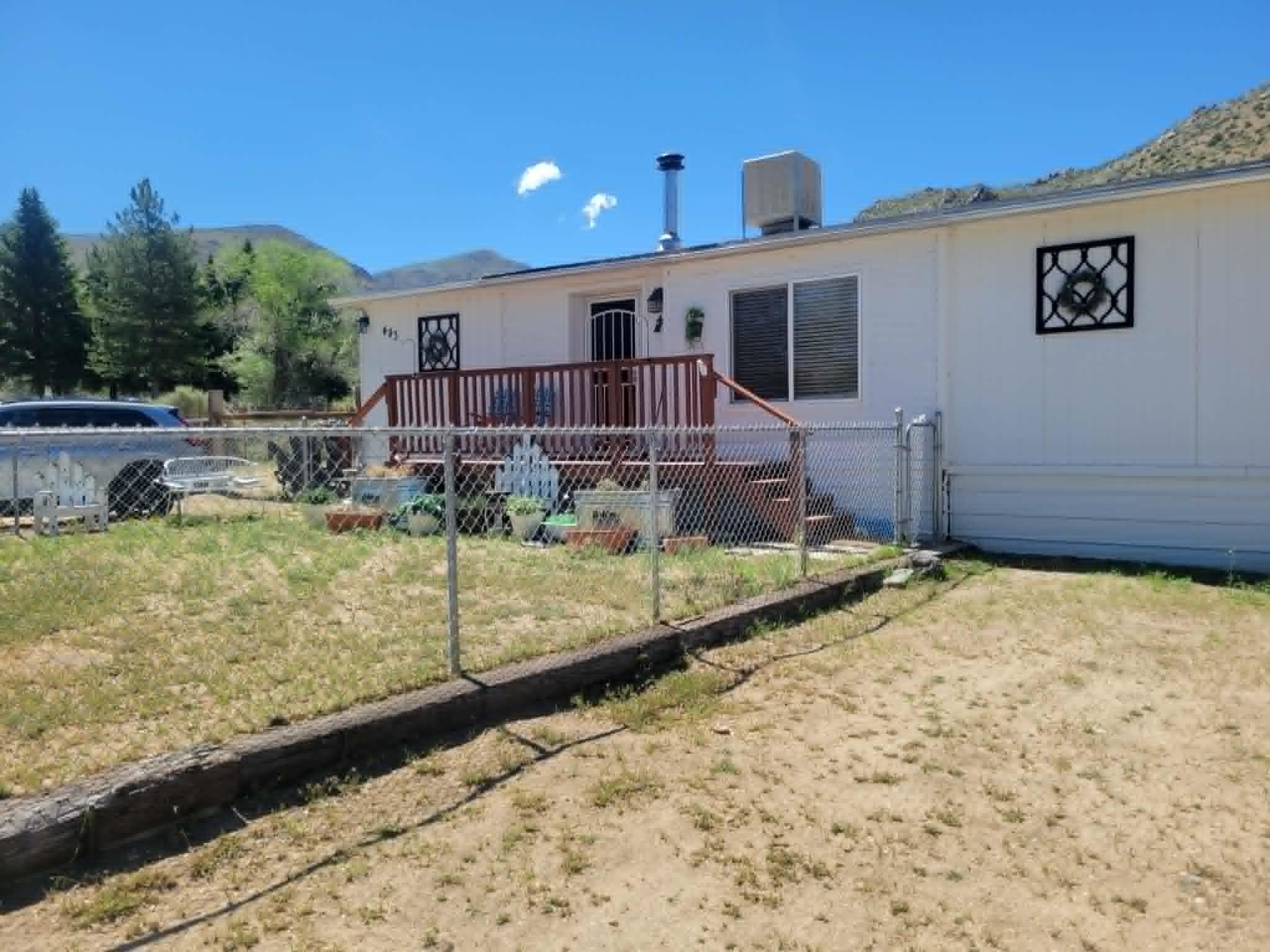 493 Mule Deer Road Coleville, CA 96107 - Photo 2 of 39 a view of a house with backyard and sitting area