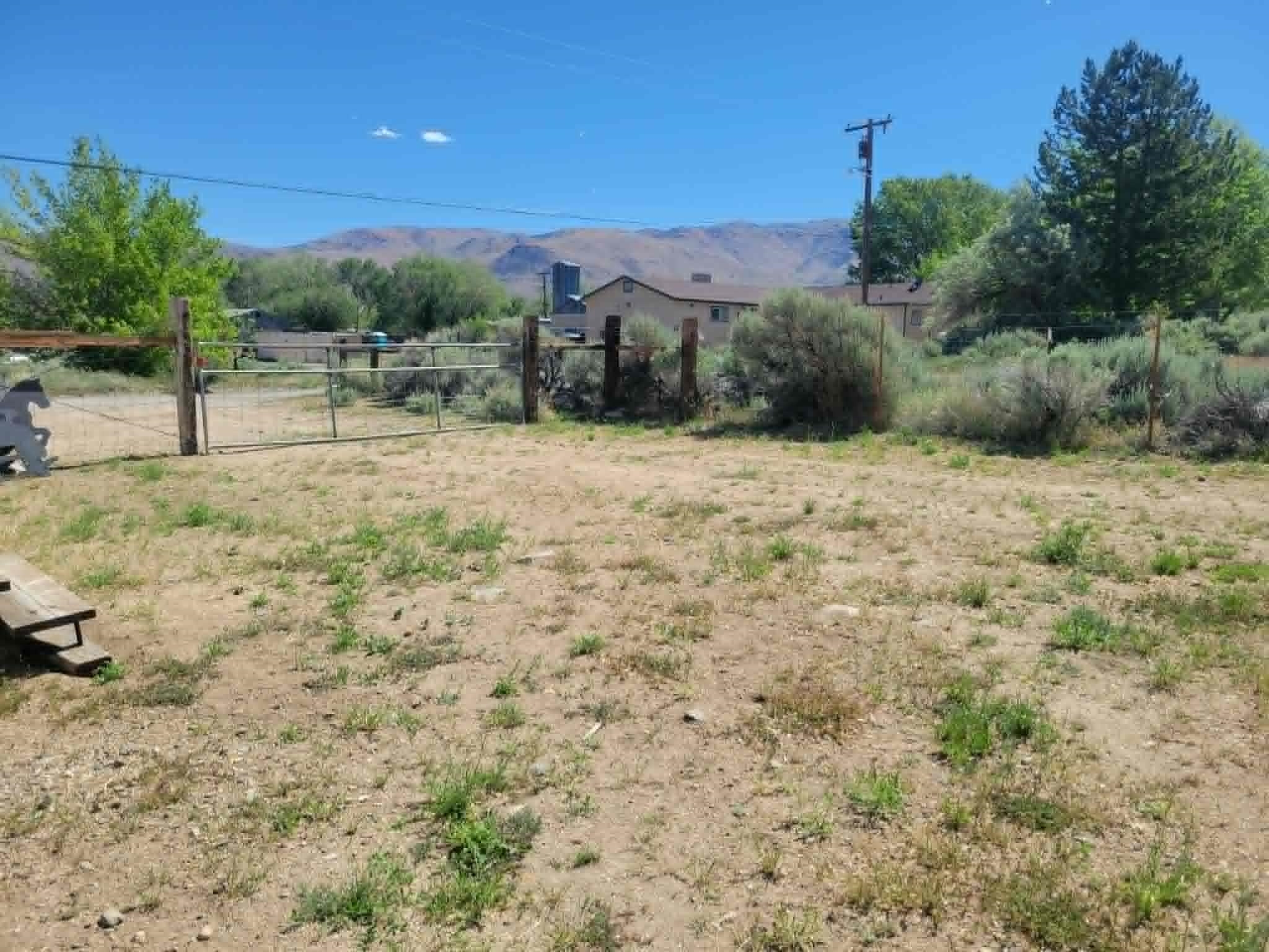 493 Mule Deer Road Coleville, CA 96107 - Photo 30 of 39 a view of a dry yard with wooden fence