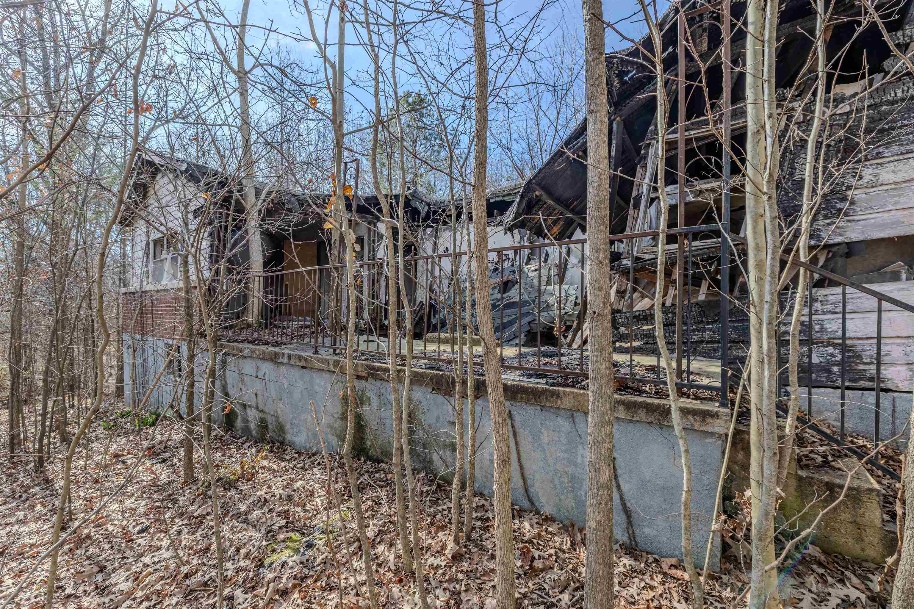 5155 Benjestown Road Memphis, TN 38127 - Photo 11 of 36 a backyard of a building with barbeque oven