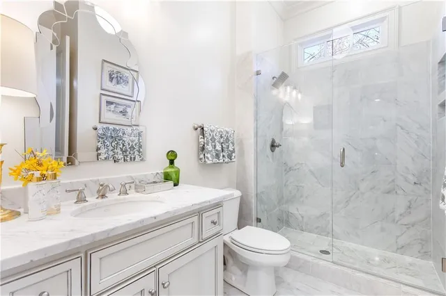 a living room with furniture kitchen and a table