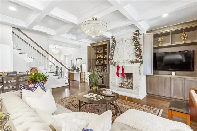 a kitchen with stainless steel appliances kitchen island granite countertop a sink and cabinets