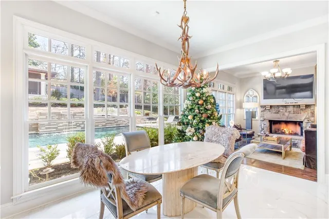 a spacious bathroom with a sink and a mirror