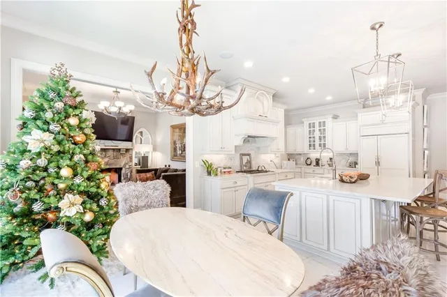 a white bath tub sitting next to a shower