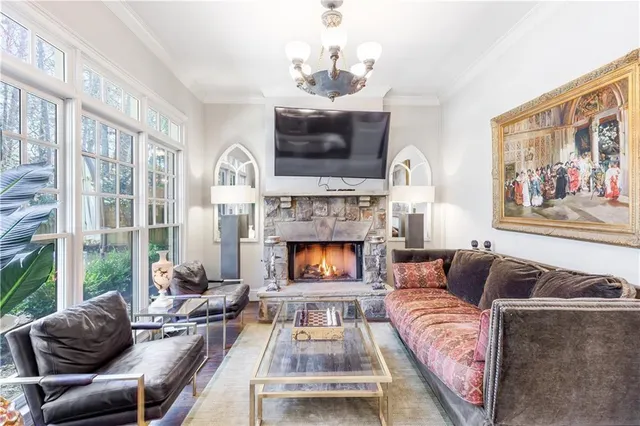 a bedroom with a bed and a chair