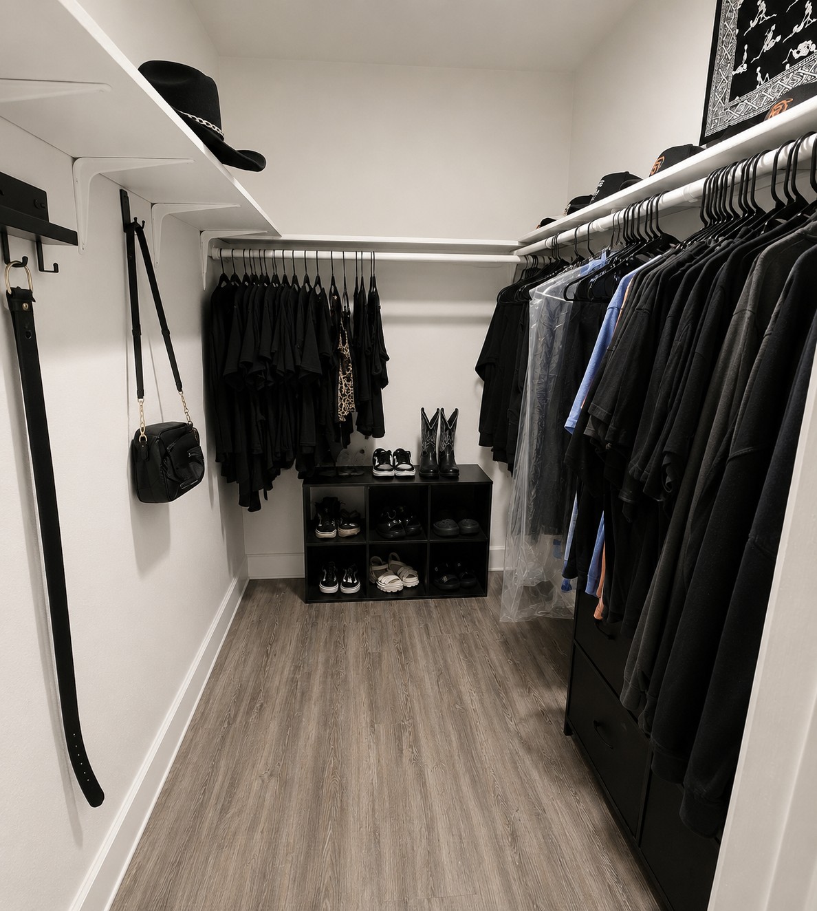 2013 Margalene Way Austin, TX 78728 - Photo 17 of 19 Functional walk-in closet featuring ample shelving and hanging space for an organized wardrobe.