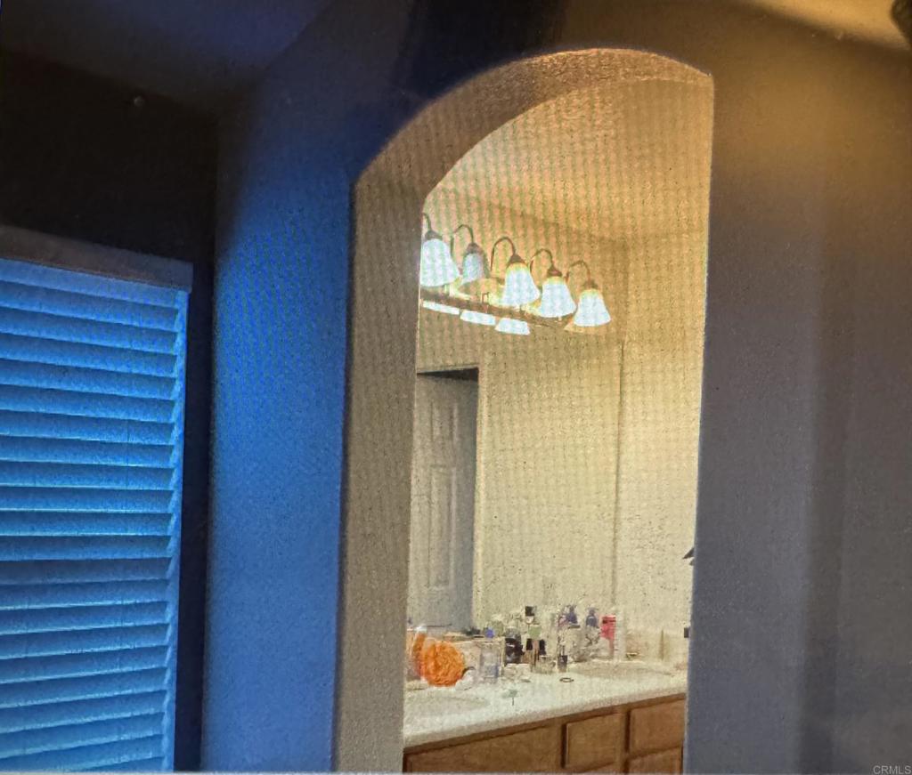 16941 Meadowlark Ridge Road, Unit 1 San Diego, CA 92127 - Photo 15 of 30 a view of an entryway with a hallway