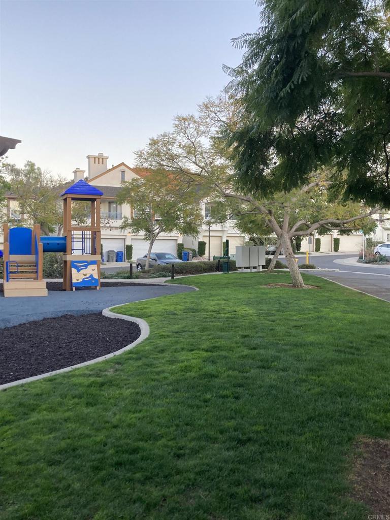 16941 Meadowlark Ridge Road, Unit 1 San Diego, CA 92127 - Photo 24 of 30 a view of a park with large trees