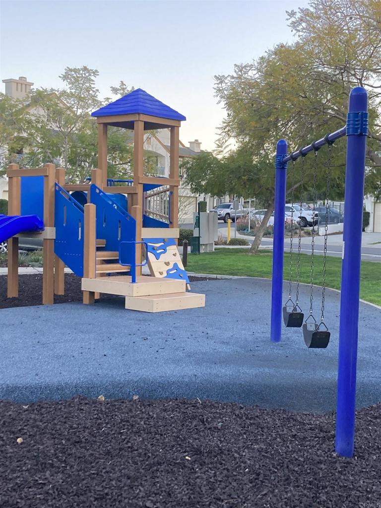 16941 Meadowlark Ridge Road, Unit 1 San Diego, CA 92127 - Photo 28 of 30 a view of a park with slide