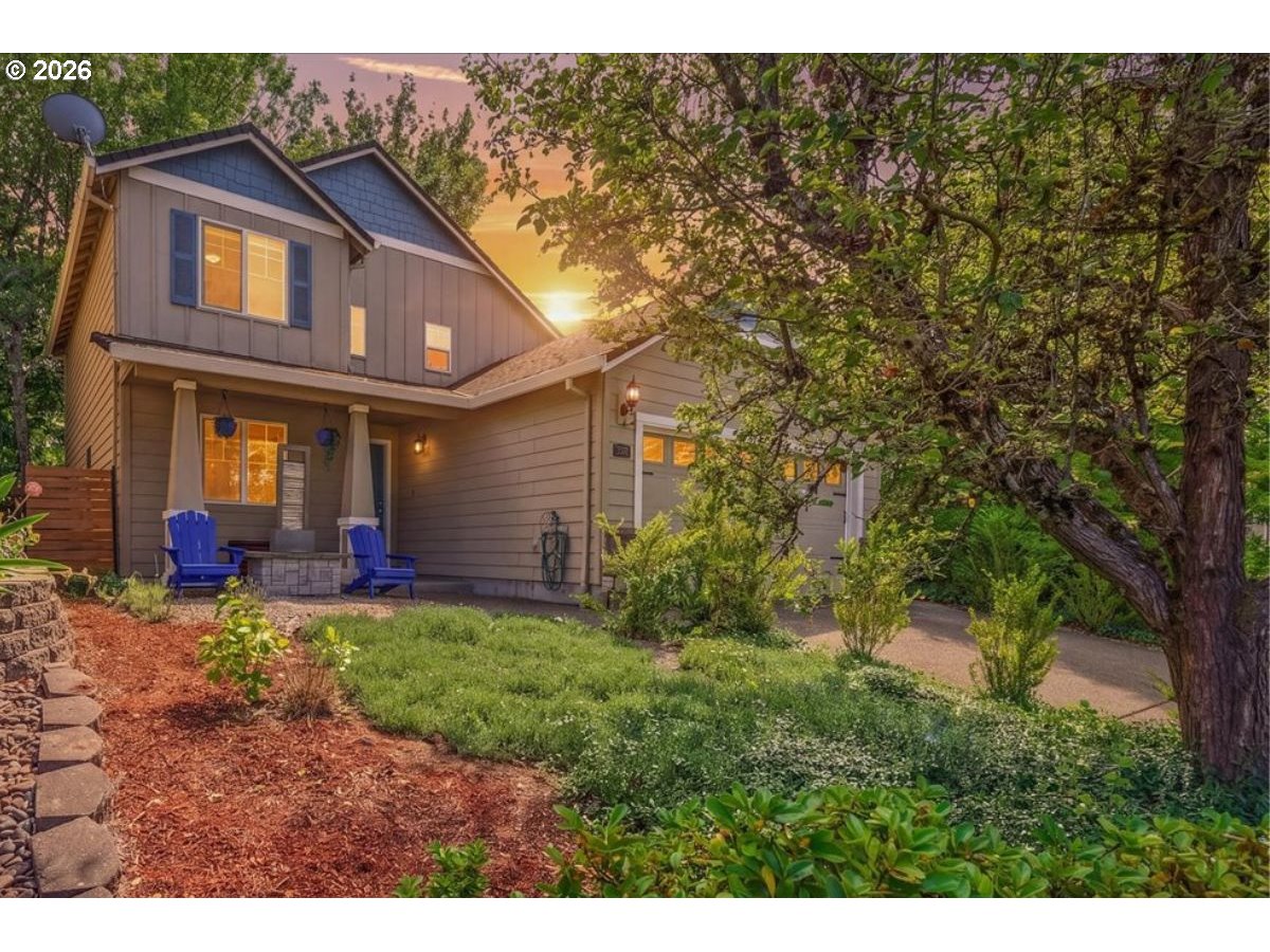 19240 Southwest Rosedale Court Beaverton, OR 97007 - Photo 1 of 38 a view of a house with a small yard and a garden