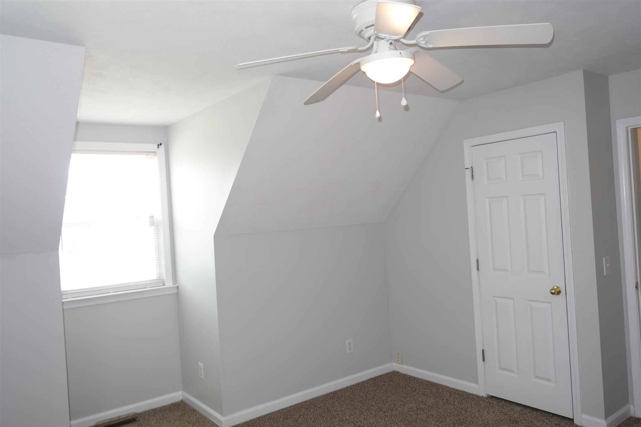 1545 Ridgemont Drive La Vergne, TN 37086 - Photo 15 of 25 an empty room with a window and a fan
