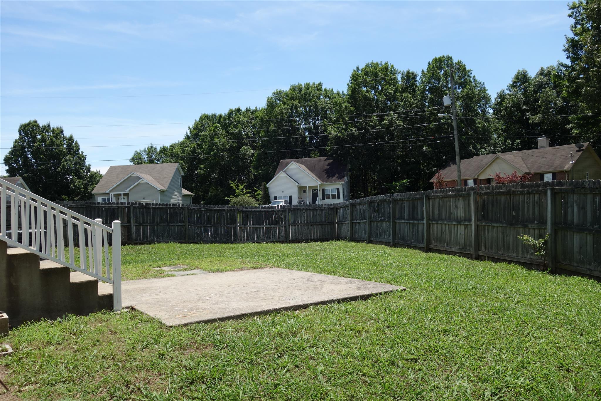 1545 Ridgemont Drive La Vergne, TN 37086 - Photo 4 of 25 a view of a yard with wooden fence